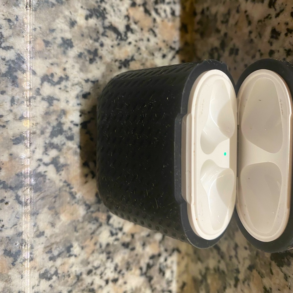 Empty airpord charging case with protecting cover